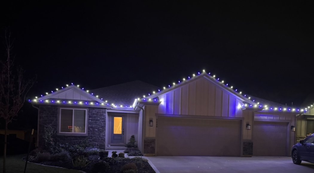 Red and white Christmas lights two story